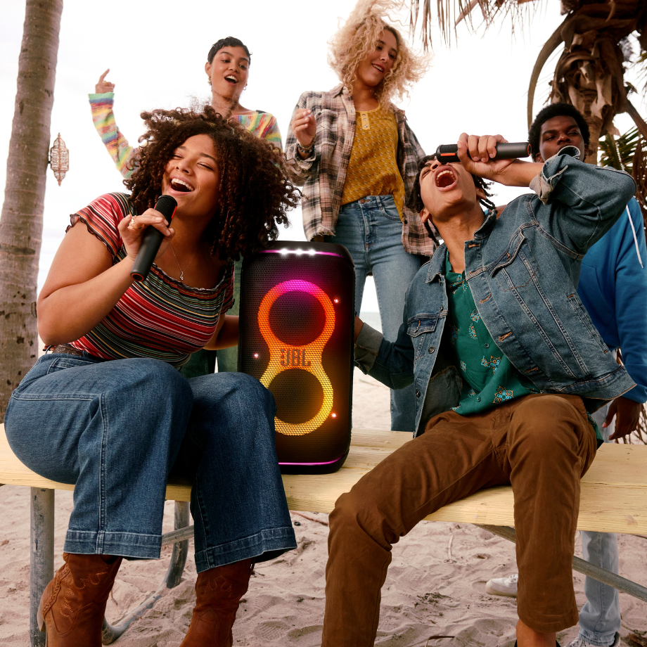 JJBL PartyBox Club 120 - Outdoor Bluetooth Speaker with Mic and Guitar InputsBL PartyBox Club 120 JBL PartyBox Club 120 speaker with dual mic and guitar inputs, displayed outdoors at a party