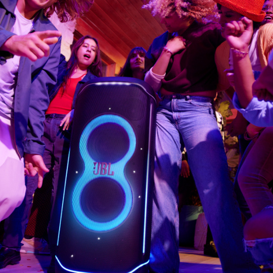 JBL PartyBox Ultimate connected to a smartphone via Bluetooth. Stream your favorite tunes effortlessly with Bluetooth and Wi-Fi.